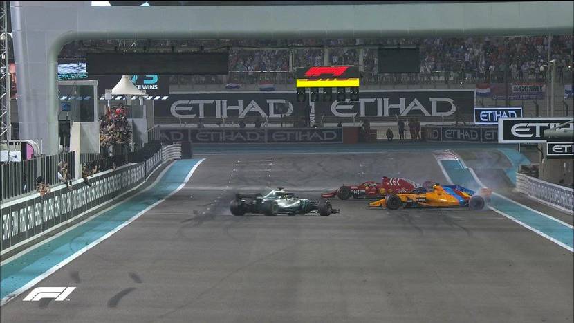 Alonso, Hamilton and Vettel making donuts on the finish line